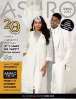 A woman wearing a vibrant African-inspired dress and matching headwrap from the Ashro Catalog collection.