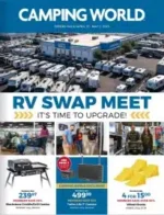 Camping World: A well-equipped RV parked at a scenic lakeside campsite with outdoor chairs and a clear sky.