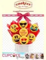 Cookies by Design Catalog: A colorful arrangement of hand-decorated sugar cookies in a decorative basket
