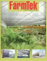 FarmTek - Farm and Garden Catalog: A large commercial greenhouse structure with galvanized steel frames and polycarbonate panels under a clear blue sky.