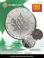 A diverse collection of gold and silver coins from the GovMint catalog arranged on a wooden surface.