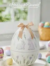 A variety of gourmet gift baskets and boxes from the Harry & David catalog including pears and snacks.