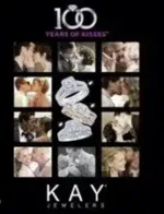 Kay Jewelers Catalog: A close-up of various diamond rings and gold necklaces displayed in a professional jewelry setting.