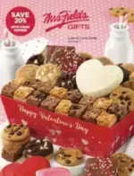 A variety of fresh-baked cookies and brownies from the Mrs. Fields Gifts Catalog arranged in a decorative gift tin.