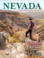 Nevada Travel Guide: A scenic view of Nevada desert mountains and a winding open road under a clear blue sky.