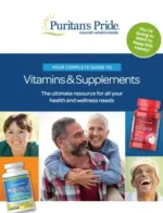 A wide selection of vitamin and supplement bottles from the Puritan's Pride catalog arranged on a clean wooden surface.