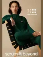 Scrubs & Beyond Catalog: A professional nurse wearing high-quality navy blue medical scrubs with multiple pockets