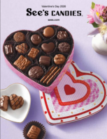 A variety of See's Candies chocolates and lollipops arranged neatly for a gift catalog presentation.