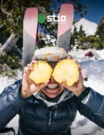 Stio Outdoor Apparel Catalog: A collection of technical outdoor jackets and mountain apparel displayed against a rugged landscape background.