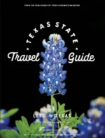 Texas Travel Guide: A scenic view of the Texas Hill Country during sunset with bluebonnets in the foreground.