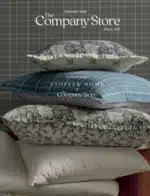 Company Store Catalog: Close-up of layers of premium white bedding including a duvet